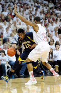 Vander Blue and Marquette struggled to get inside the paint Sunday afternoon in a loss to Louisville. (USA Today Images)