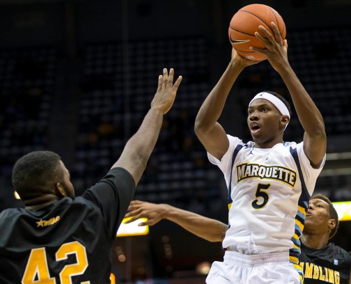 Jajuan Johnson and the Marquette guards were excellent late in Monday night's loss at Arizona State. (USA Today)